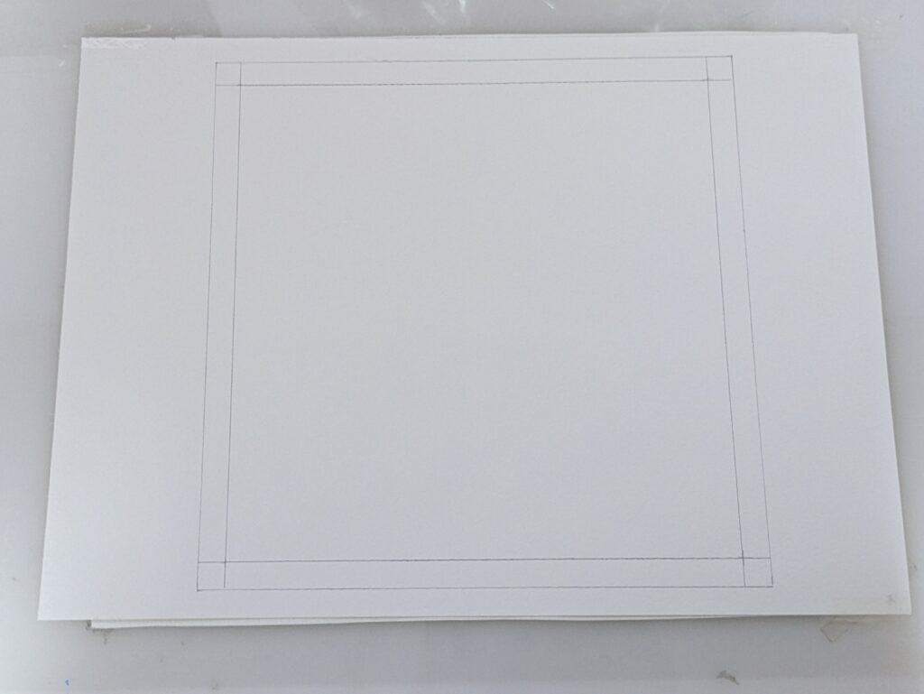 枠線が描かれた画用紙
