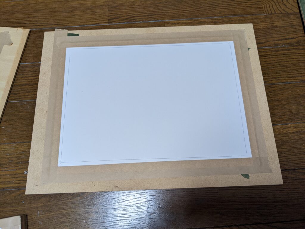 ムシムシ王国のぼうけん四隅を水張りした画用紙